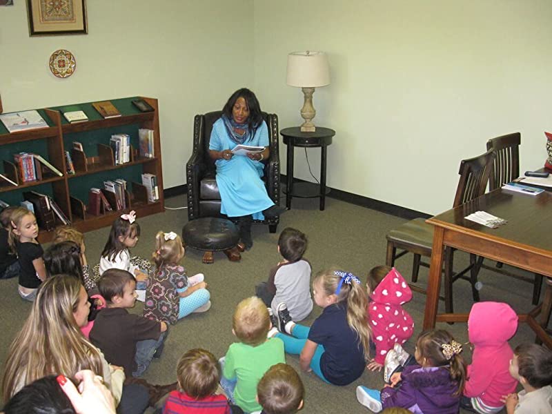 Reading to children at St. Christopher's Episcopal Church, Webster, TX